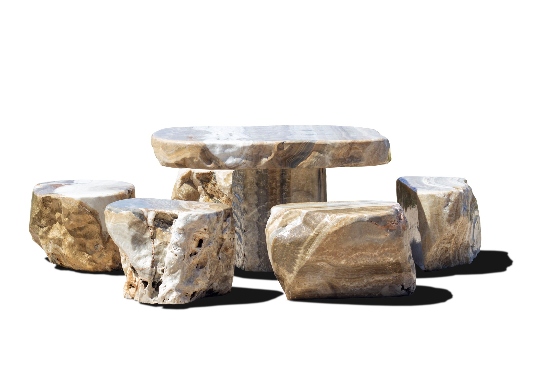 Set of table and chairs made from stone isolated on white background included clipping path.