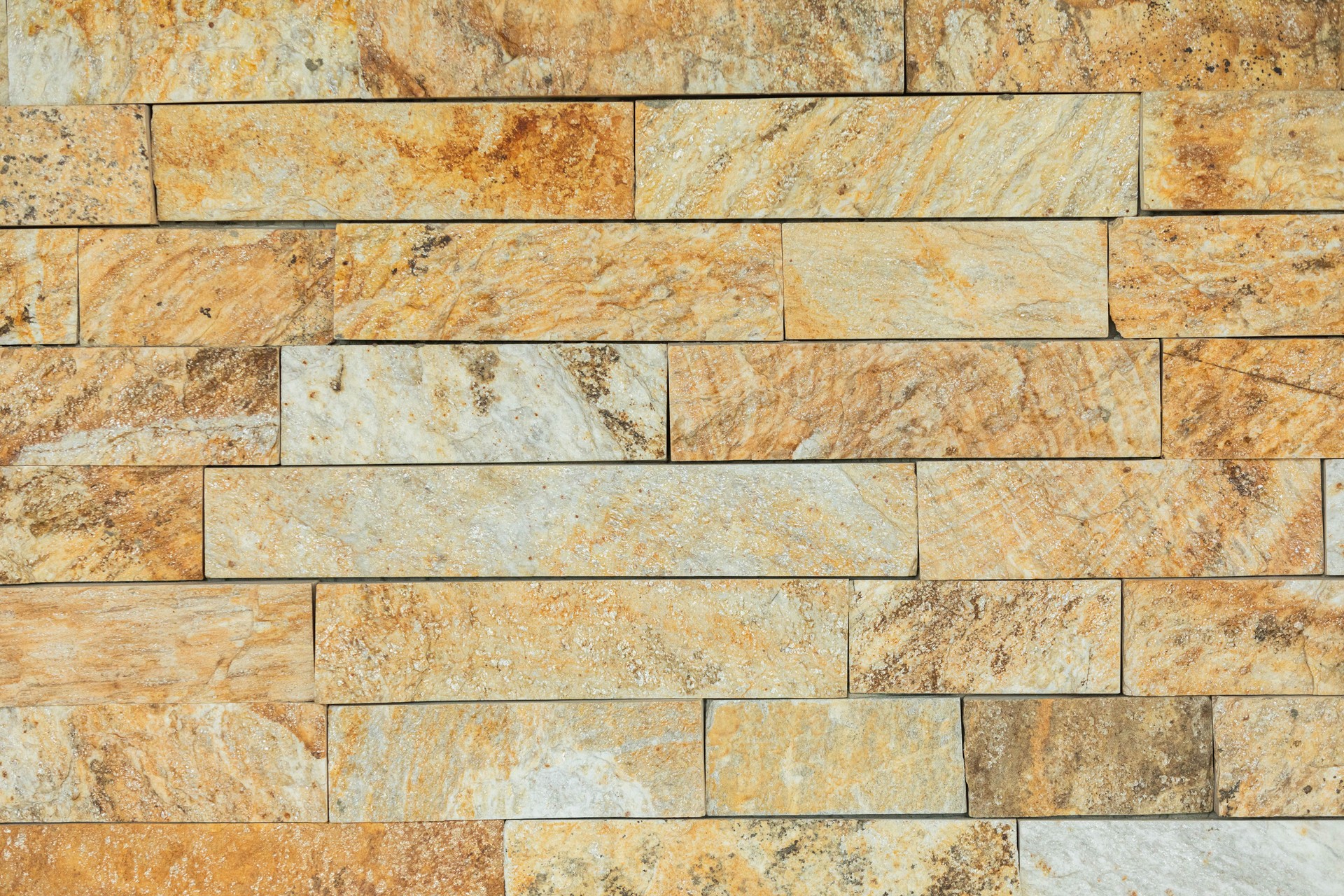 Exploring the Textured Natural Stone Wall Design for Enhancing Modern Interiors Aesthetic Appeal